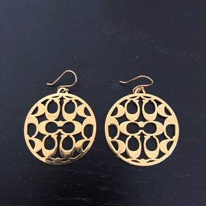 Gold Coach earrings